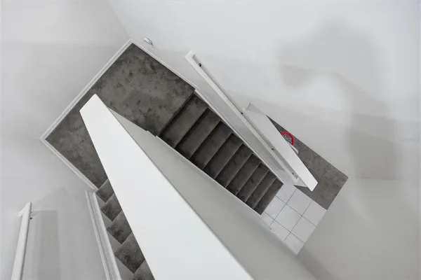 a bathroom with a sink toilet and a mirror