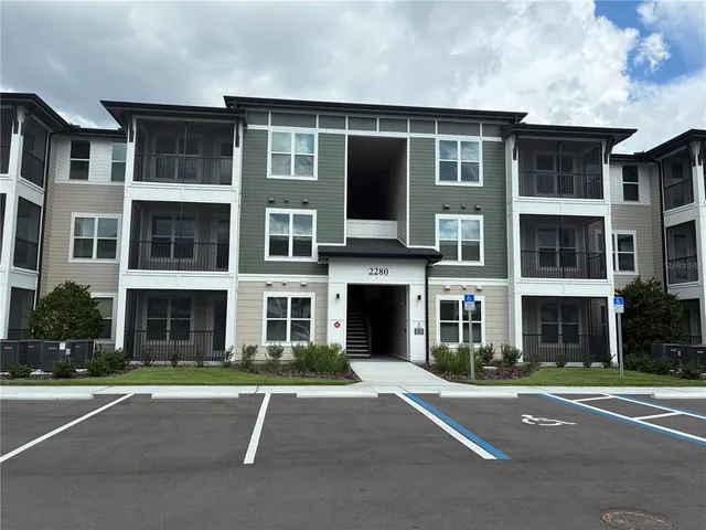 a front view of a building with a street