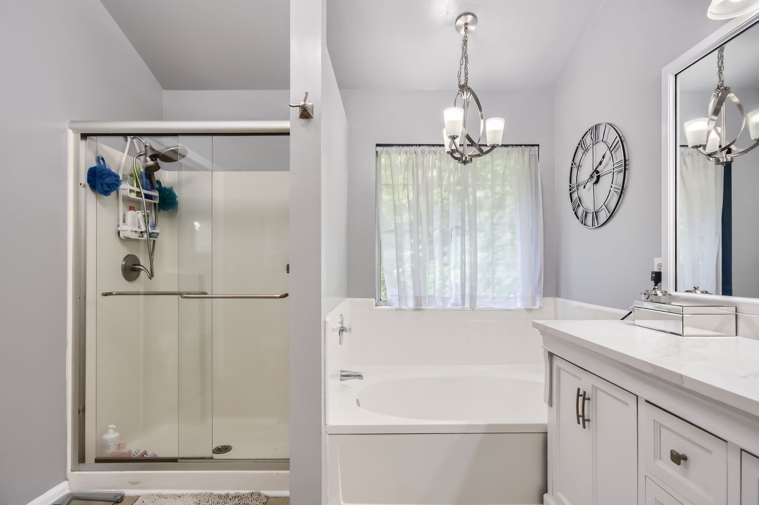 5244 Beech Ridge Road Nashville, TN 37221 - Photo 16 of 31 a bathroom with a granite countertop sink mirror and a shower