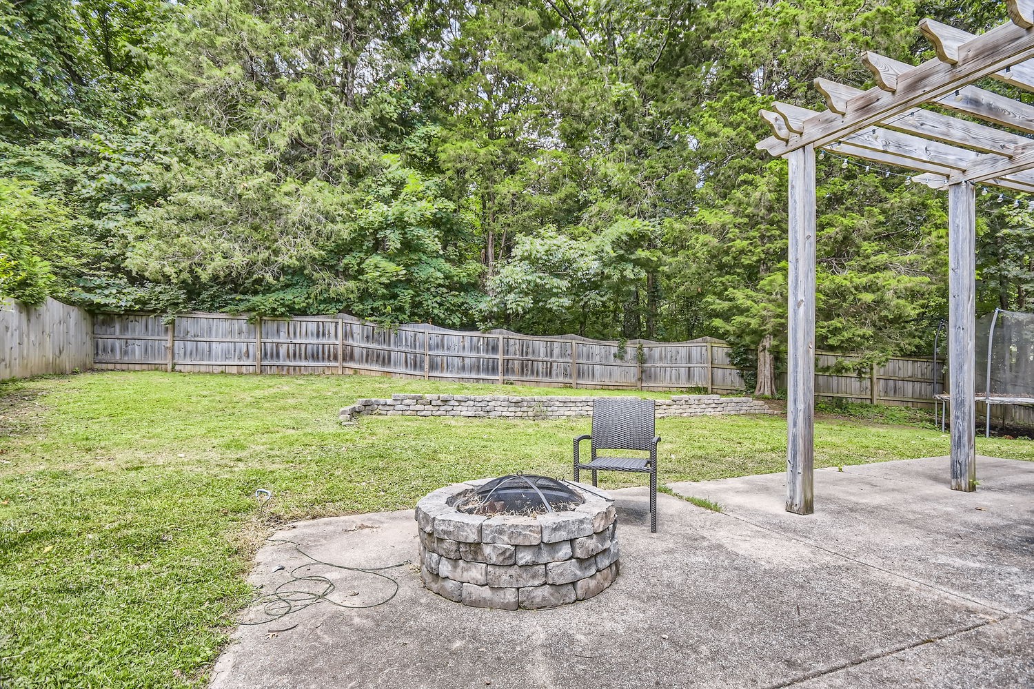 5244 Beech Ridge Road Nashville, TN 37221 - Photo 27 of 31 a view of a backyard with a garden and entertaining space