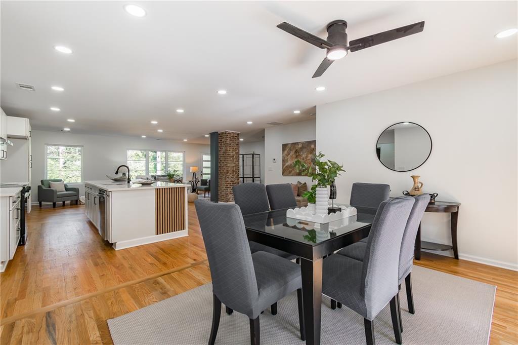 2651 Pangborn Road Decatur, GA 30033 - Photo 13 of 31 a dining room with furniture and a mirror