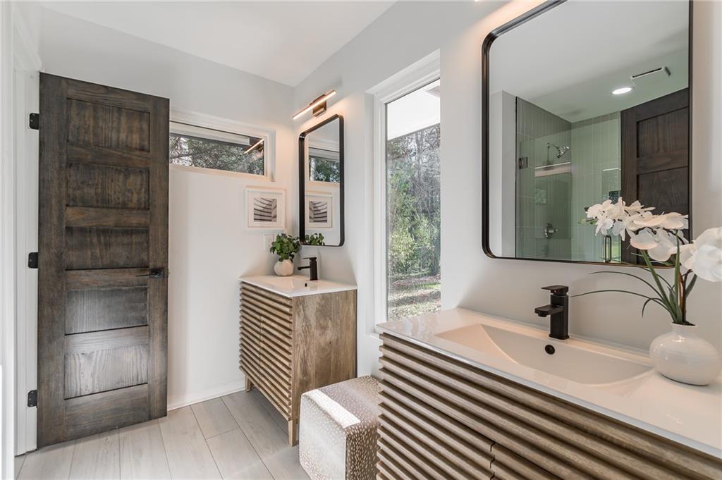 2651 Pangborn Road Decatur, GA 30033 - Photo 16 of 31 a bathroom with a sink and a mirror