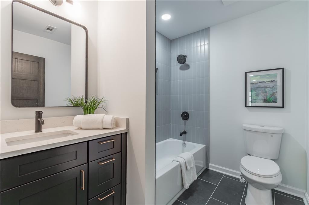 2651 Pangborn Road Decatur, GA 30033 - Photo 21 of 31 a bathroom with a sink toilet and shower