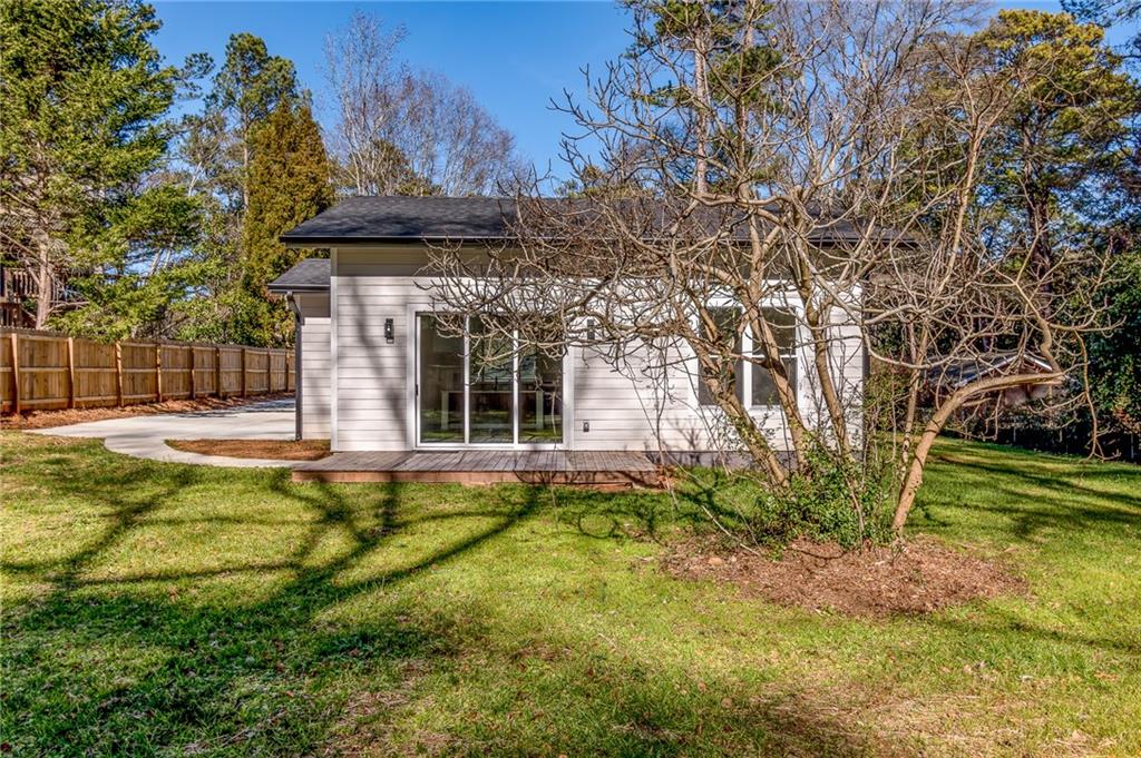 2651 Pangborn Road Decatur, GA 30033 - Photo 31 of 31 a view of a house with a small yard and a large tree