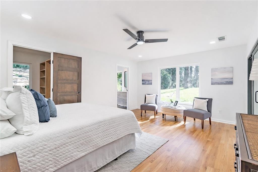 2651 Pangborn Road Decatur, GA 30033 - Photo 5 of 31 a bedroom with a bed and wooden floor