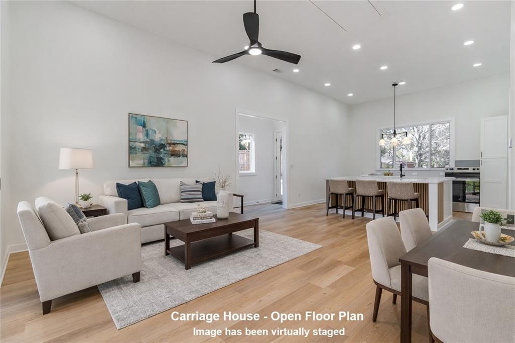 2651 Pangborn Road Decatur, GA 30033 - Photo 7 of 31 a living room with furniture and a chandelier