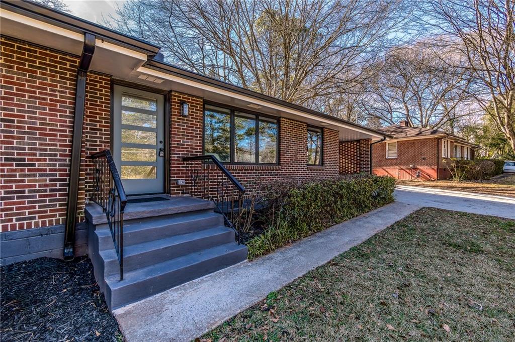 2651 Pangborn Road Decatur, GA 30033 - Photo 9 of 31 a front view of a house with a yard