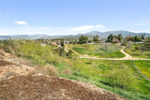 a view of a lake with a yard