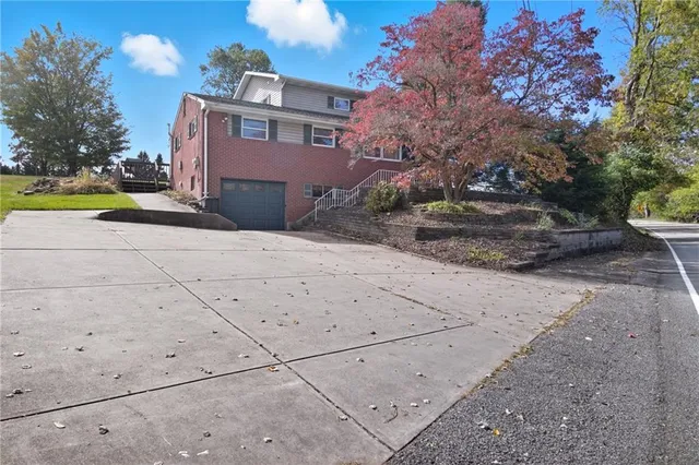 a house view with a garden space