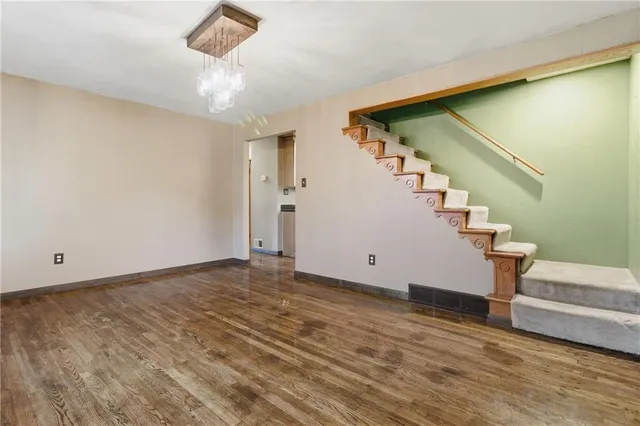 a bathroom with a sink a toilet and bathtub