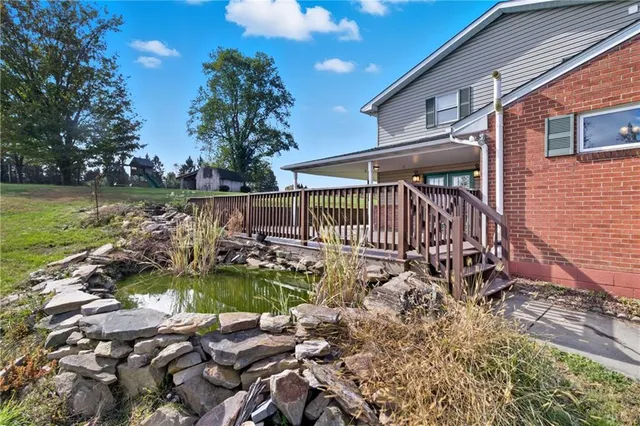 a view of a lake with a yard