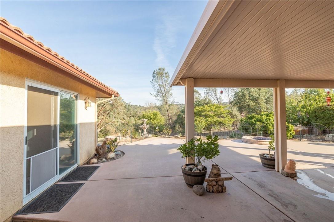 32057 River Knolls Road Coarsegold, CA 93614 - Photo 13 of 73 a building outdoor space with seating space