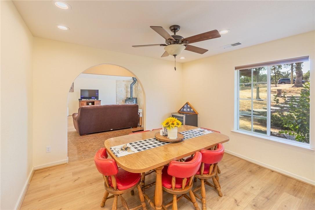 32057 River Knolls Road Coarsegold, CA 93614 - Photo 4 of 73 a view of a dining room with furniture and a window