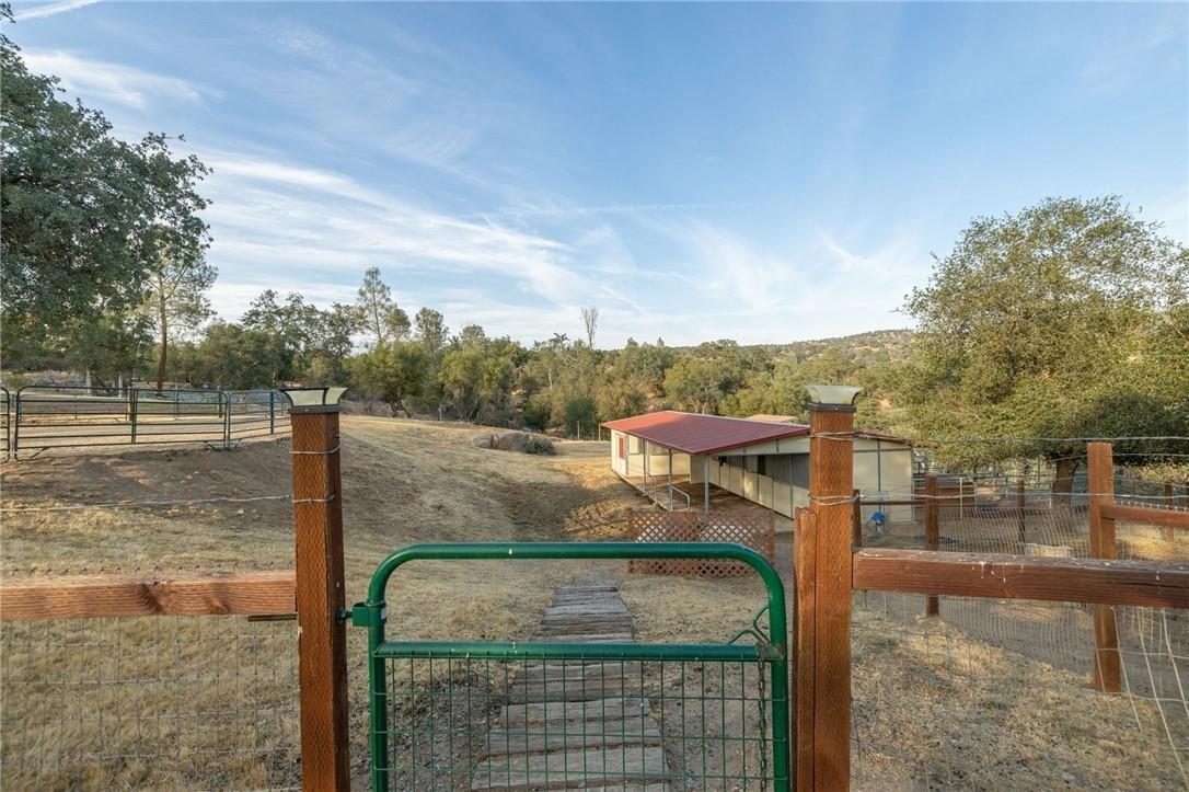 32057 River Knolls Road Coarsegold, CA 93614 - Photo 42 of 73 a view of a tennis court