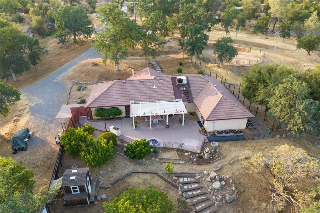 32057 River Knolls Road Coarsegold, CA 93614 - Photo 55 of 73 an aerial view of a house with yard swimming pool and outdoor seating