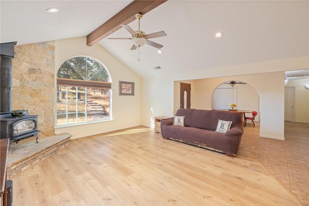 32057 River Knolls Road Coarsegold, CA 93614 - Photo 58 of 73 a living room with furniture and a large window