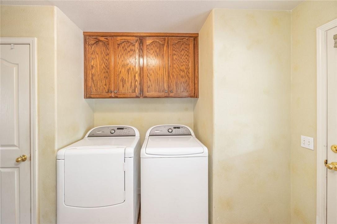 32057 River Knolls Road Coarsegold, CA 93614 - Photo 63 of 73 a utility room with dryer and washer