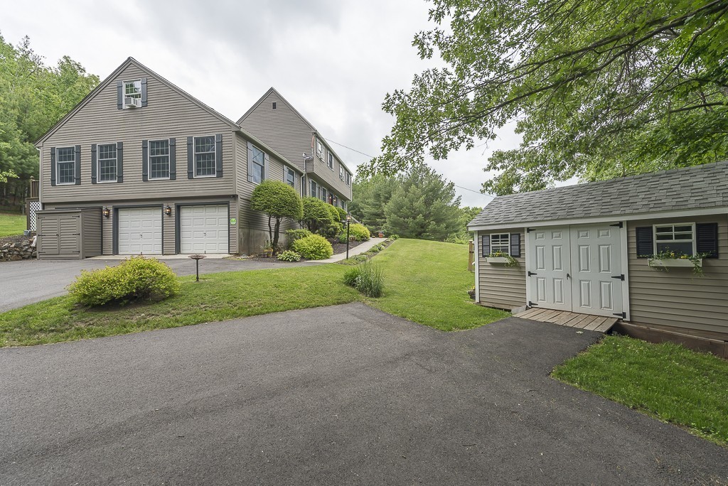 21 Pingree Farm Road Georgetown, MA 01833 - Photo 29 of 30 a view of a house with a yard and large tree