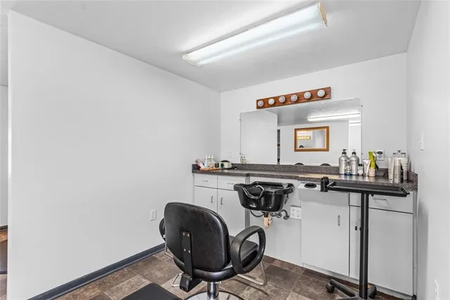 a view of a kitchen counter space and a window