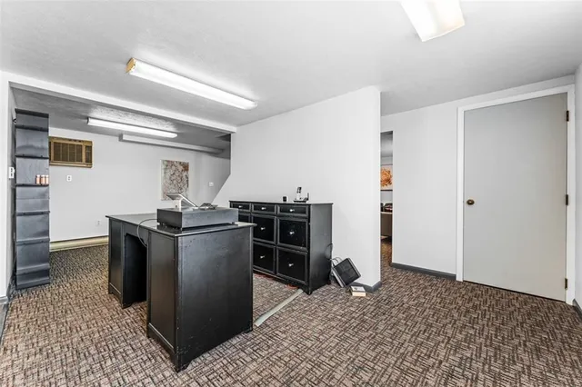 a kitchen with a stove and a refrigerator