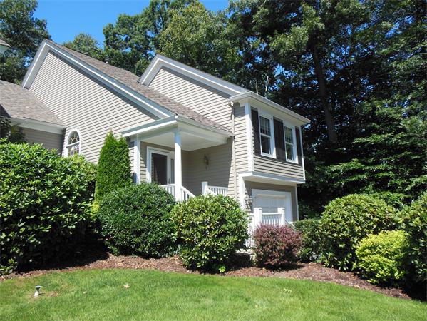 2 Shady Brook, Unit 2 West Springfield, MA 01089 - Photo 1 of 28 a front view of house with yard and trees all around