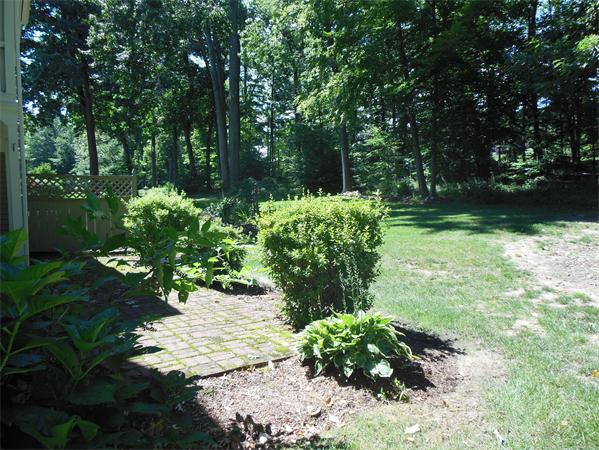 2 Shady Brook, Unit 2 West Springfield, MA 01089 - Photo 25 of 28 a backyard of a house with lots of green space