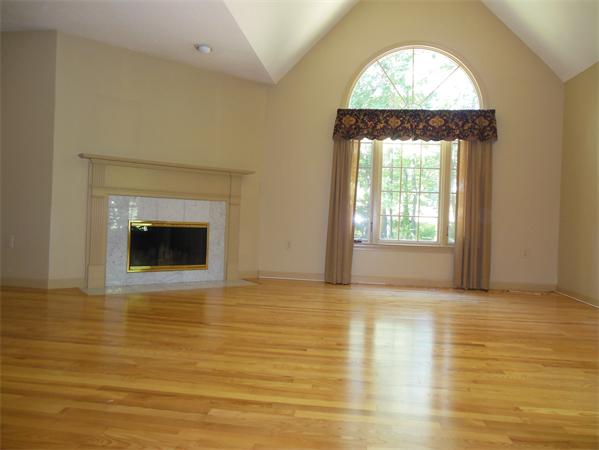 2 Shady Brook, Unit 2 West Springfield, MA 01089 - Photo 4 of 28 a view of an empty room with wooden floor and a window