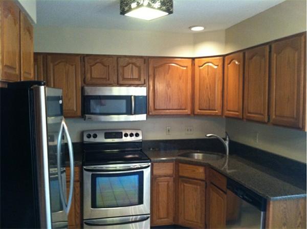 2 Shady Brook, Unit 2 West Springfield, MA 01089 - Photo 8 of 28 a kitchen with a stove and a microwave
