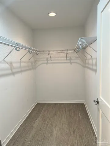 a view of a room with racks on the wall