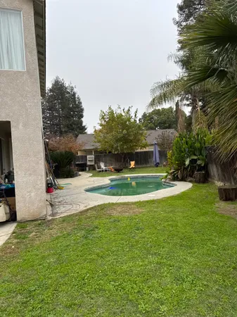 a view of a house with a big yard