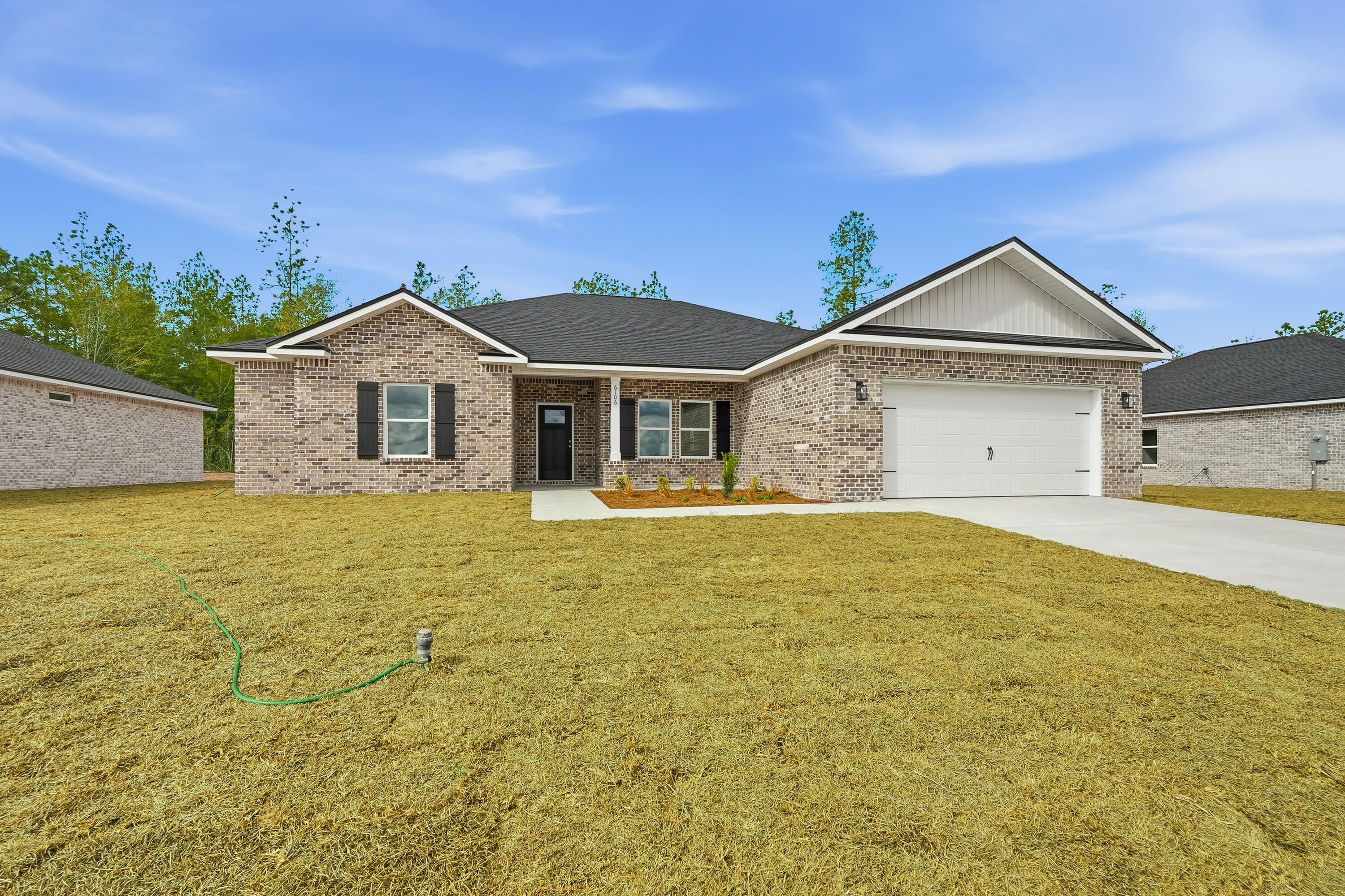 6105 Mildreds Way Crestview, FL 32539 - Photo 1 of 28 a front view of a house with yard