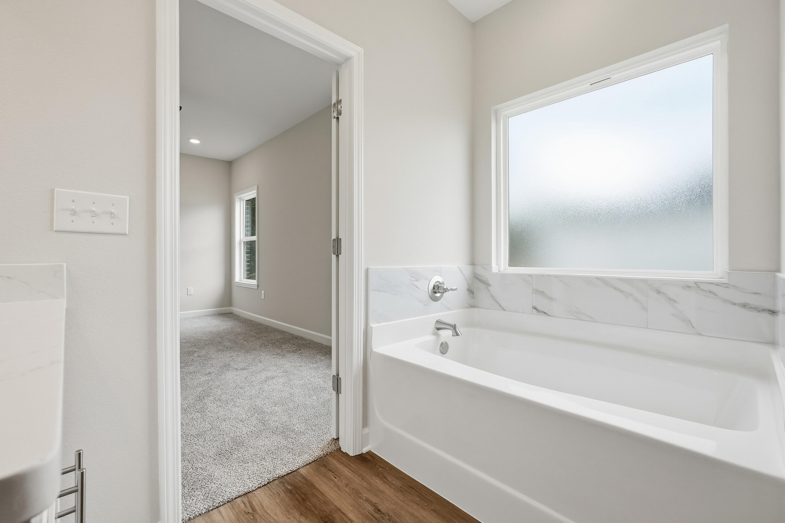 6105 Mildreds Way Crestview, FL 32539 - Photo 16 of 28 a bathroom with a bathtub and a sink