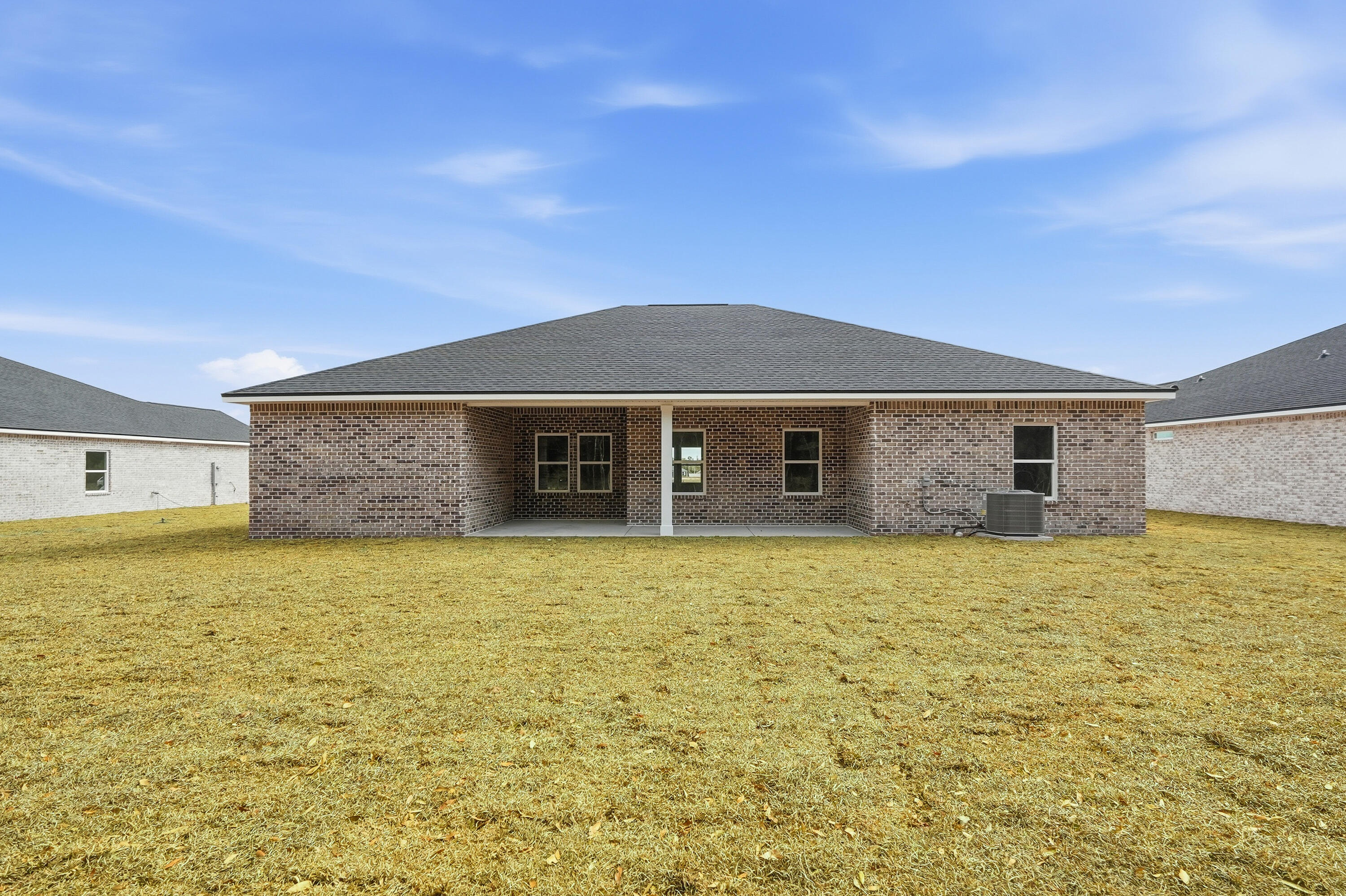 6105 Mildreds Way Crestview, FL 32539 - Photo 26 of 28 a front view of a house with a yard