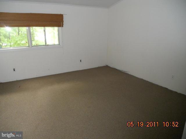 2403 Logan Road Owings Mills, MD 21117 - Photo 2 of 15 an empty room with a window