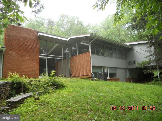 2403 Logan Road Owings Mills, MD 21117 - Photo 12 of 15 a view of a house with a yard and sitting area