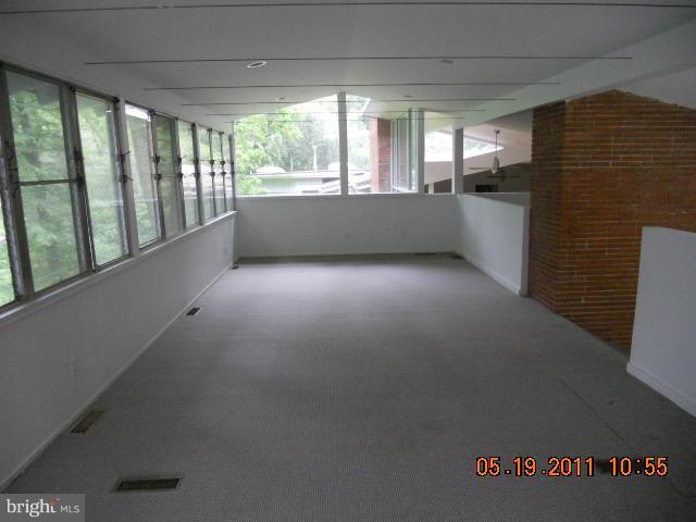 2403 Logan Road Owings Mills, MD 21117 - Photo 13 of 15 a view of an empty room and window