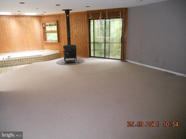 2403 Logan Road Owings Mills, MD 21117 - Photo 4 of 15 an empty room with windows