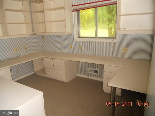 2403 Logan Road Owings Mills, MD 21117 - Photo 9 of 15 a view of a kitchen with a sink
