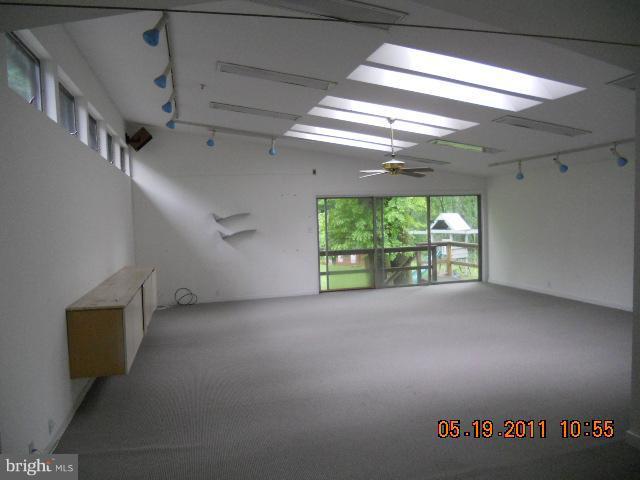 2403 Logan Road Owings Mills, MD 21117 - Photo 10 of 15 a view of hallway with stairs and a window