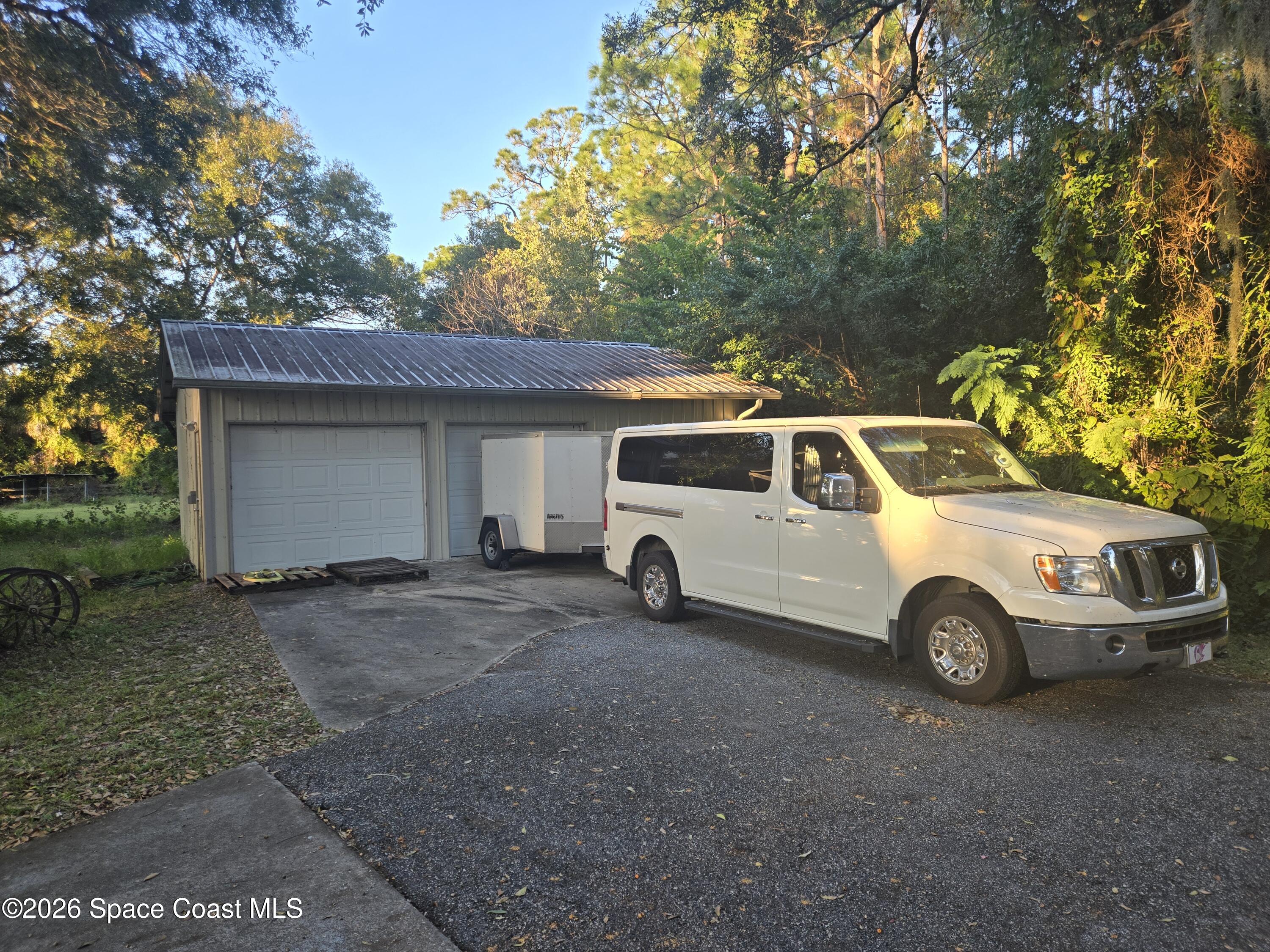5101 Craig Road Cocoa, FL 32926 - Photo 11 of 62 a view of a car in front of a house
