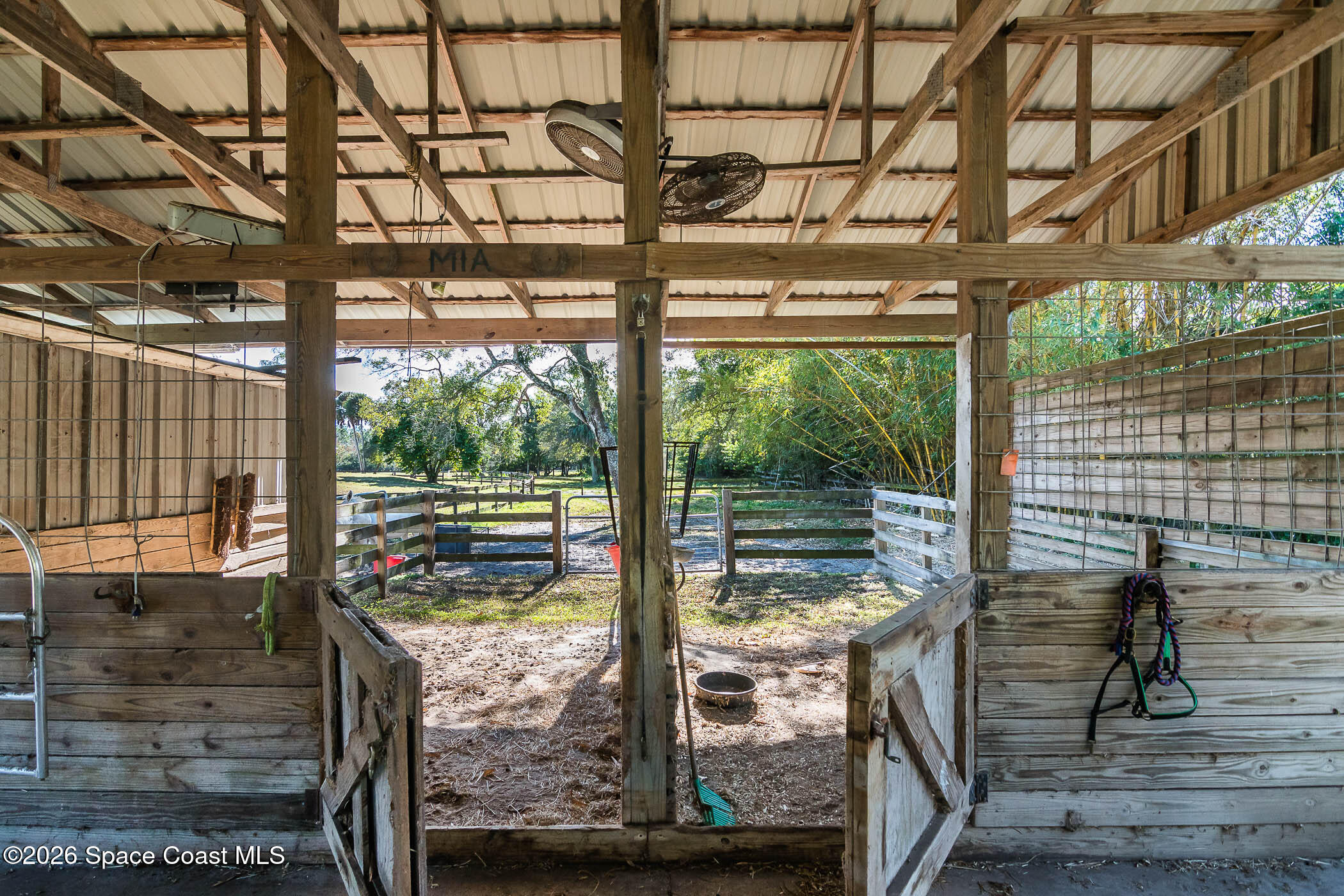 5101 Craig Road Cocoa, FL 32926 - Photo 24 of 62 a view of a porch with a bench in patio
