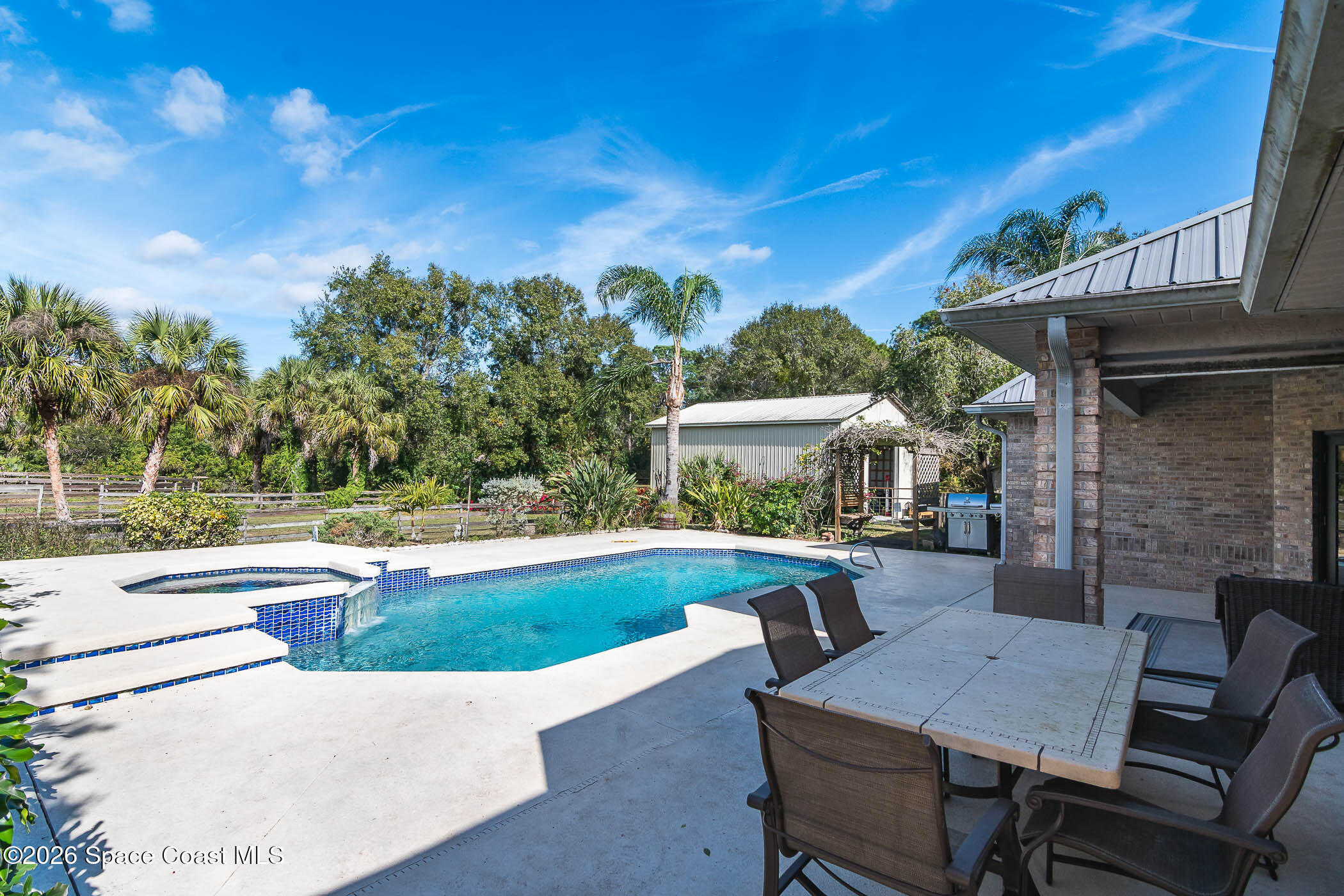 5101 Craig Road Cocoa, FL 32926 - Photo 28 of 62 a view of a swimming pool with a patio