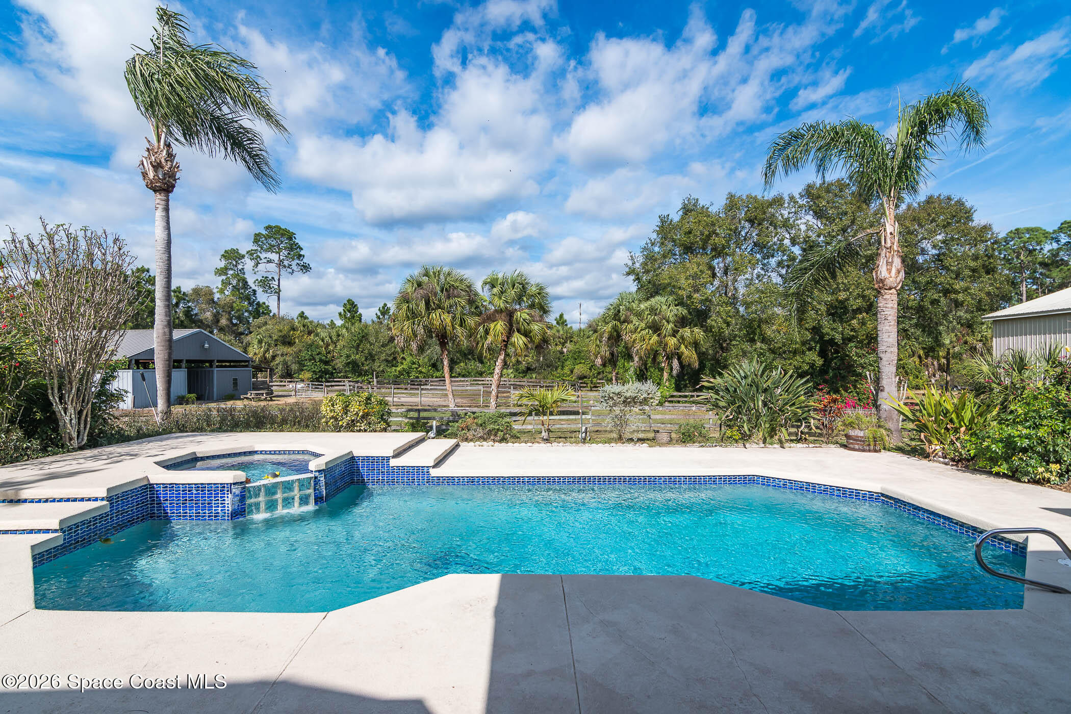 5101 Craig Road Cocoa, FL 32926 - Photo 32 of 62 a view of a swimming pool with a yard