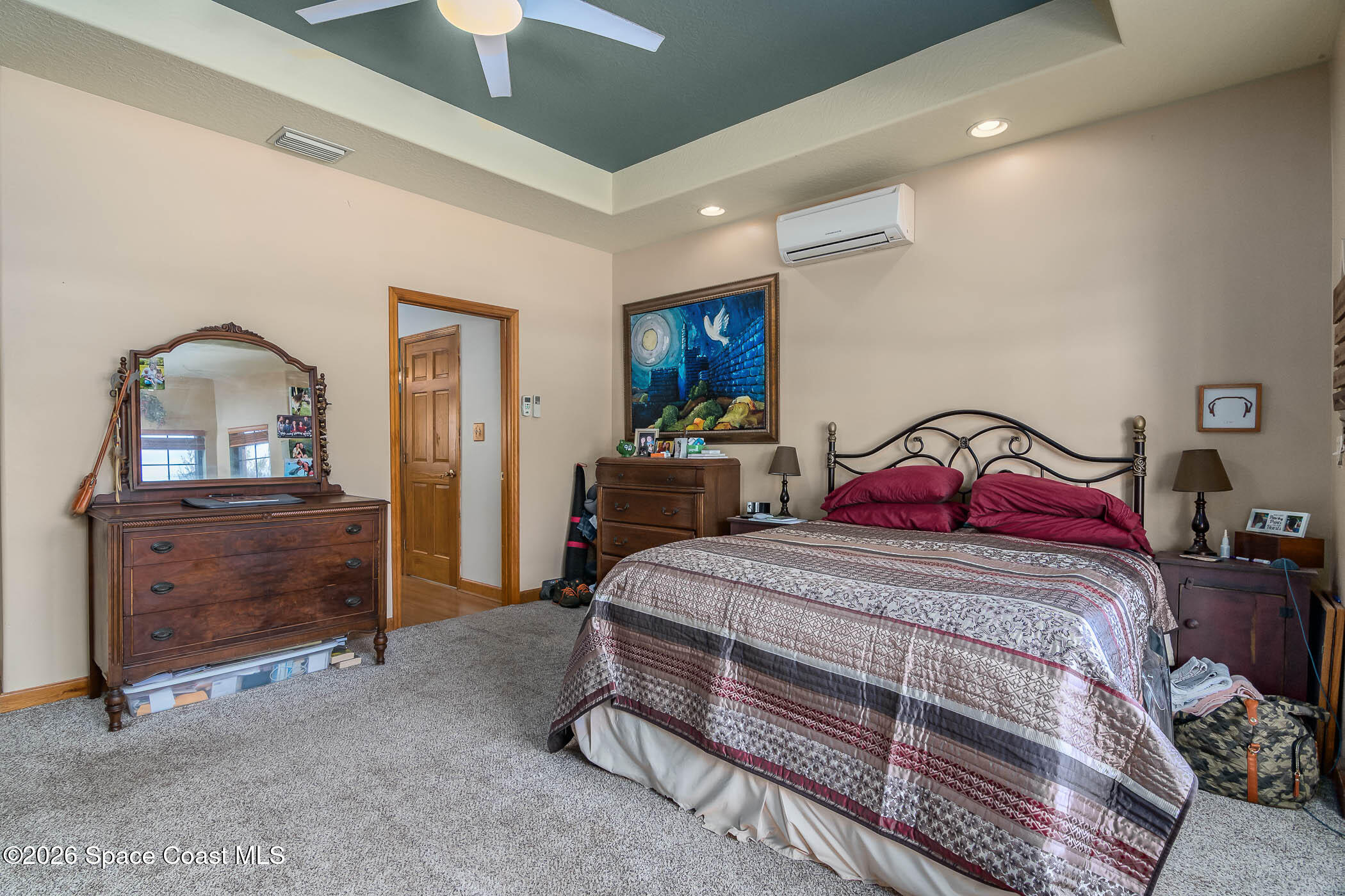 5101 Craig Road Cocoa, FL 32926 - Photo 43 of 62 a bedroom with a bed and a dresser