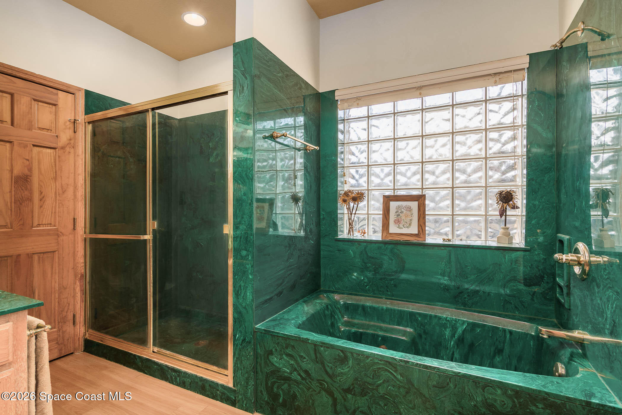 5101 Craig Road Cocoa, FL 32926 - Photo 45 of 62 a bathroom with a shower and a bathtub