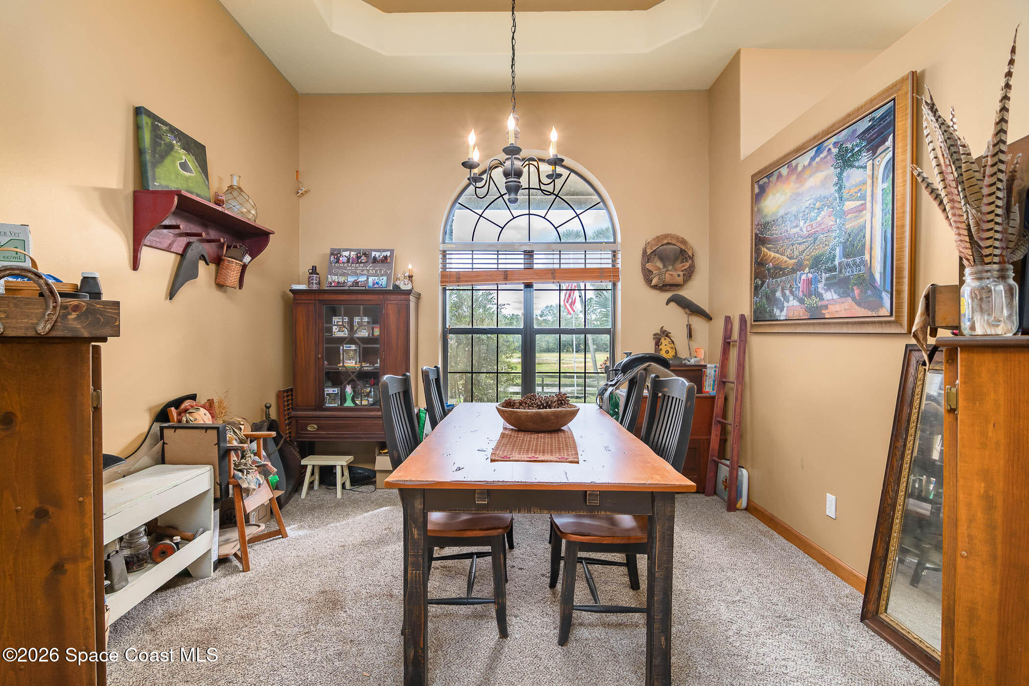5101 Craig Road Cocoa, FL 32926 - Photo 48 of 62 a view of a dining room with furniture window and outside view