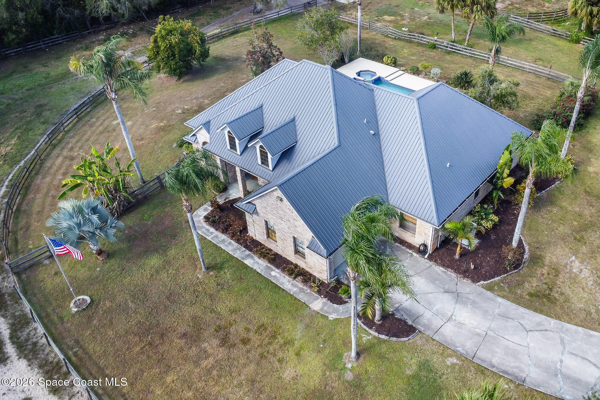 5101 Craig Road Cocoa, FL 32926 - Photo 54 of 62 an aerial view of a house with a yard and potted plants