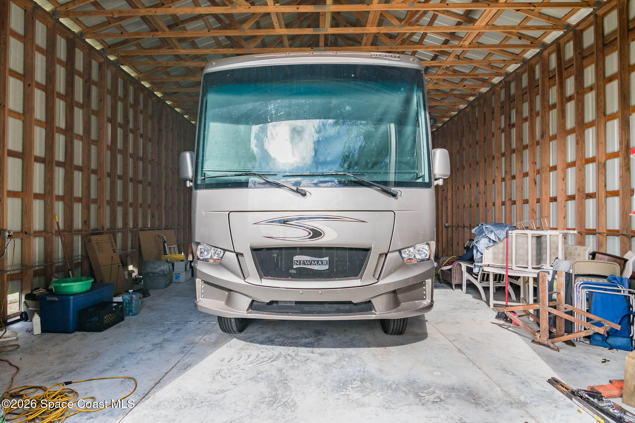 5101 Craig Road Cocoa, FL 32926 - Photo 9 of 62 a living room with a couch and a fireplace