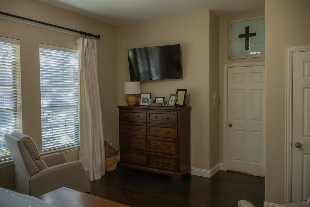 1395 Southern Rockwall, TX 75087 - Photo 11 of 22 a living room with furniture and a flat screen tv
