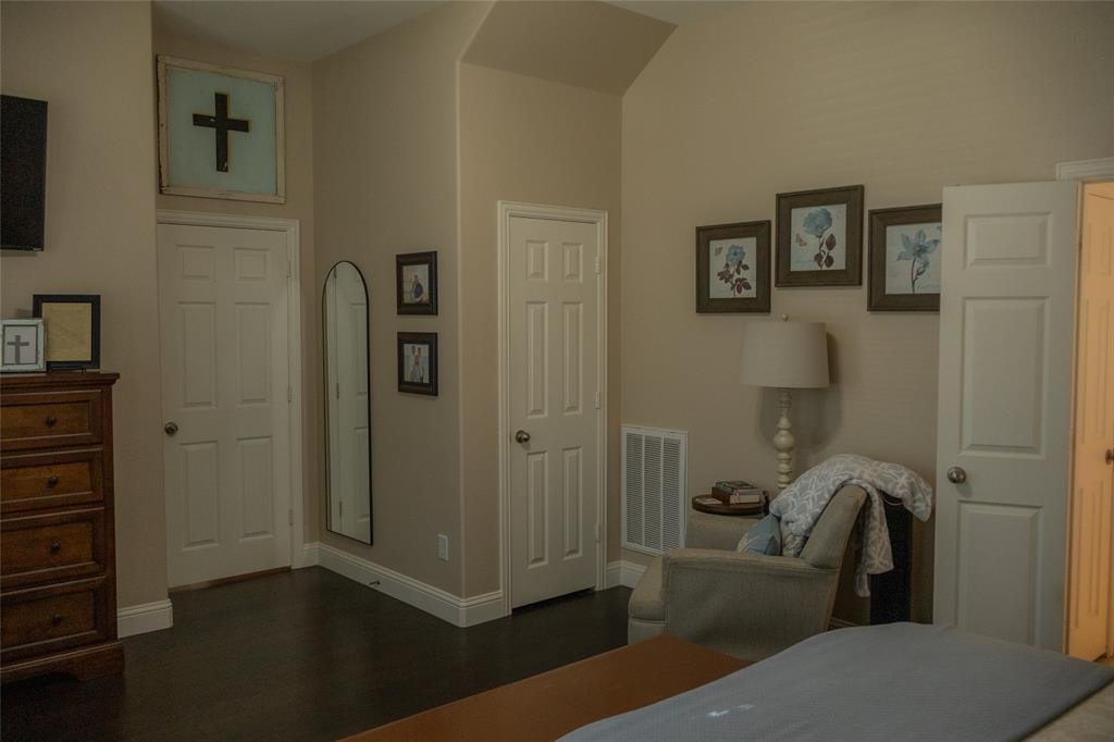 1395 Southern Rockwall, TX 75087 - Photo 12 of 22 a view of a hallway with workspace and wooden floor